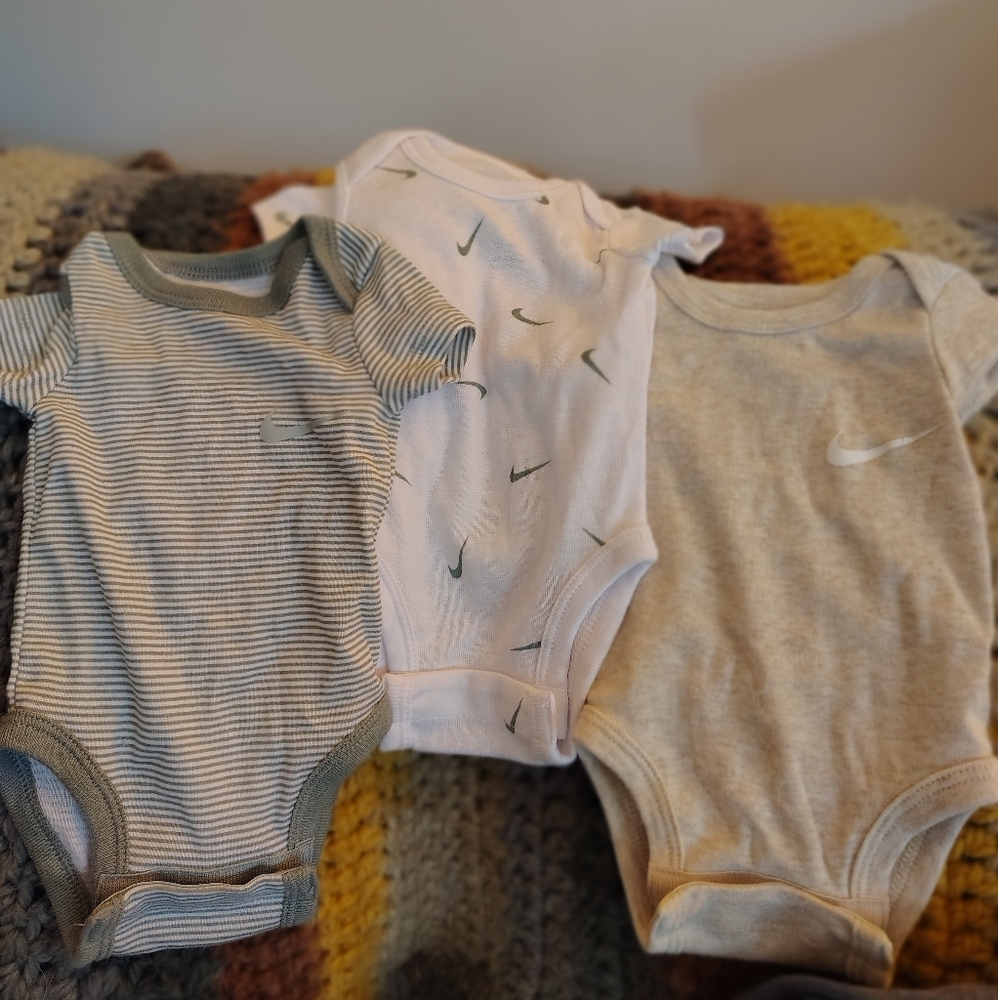 3 nb Nike onesies